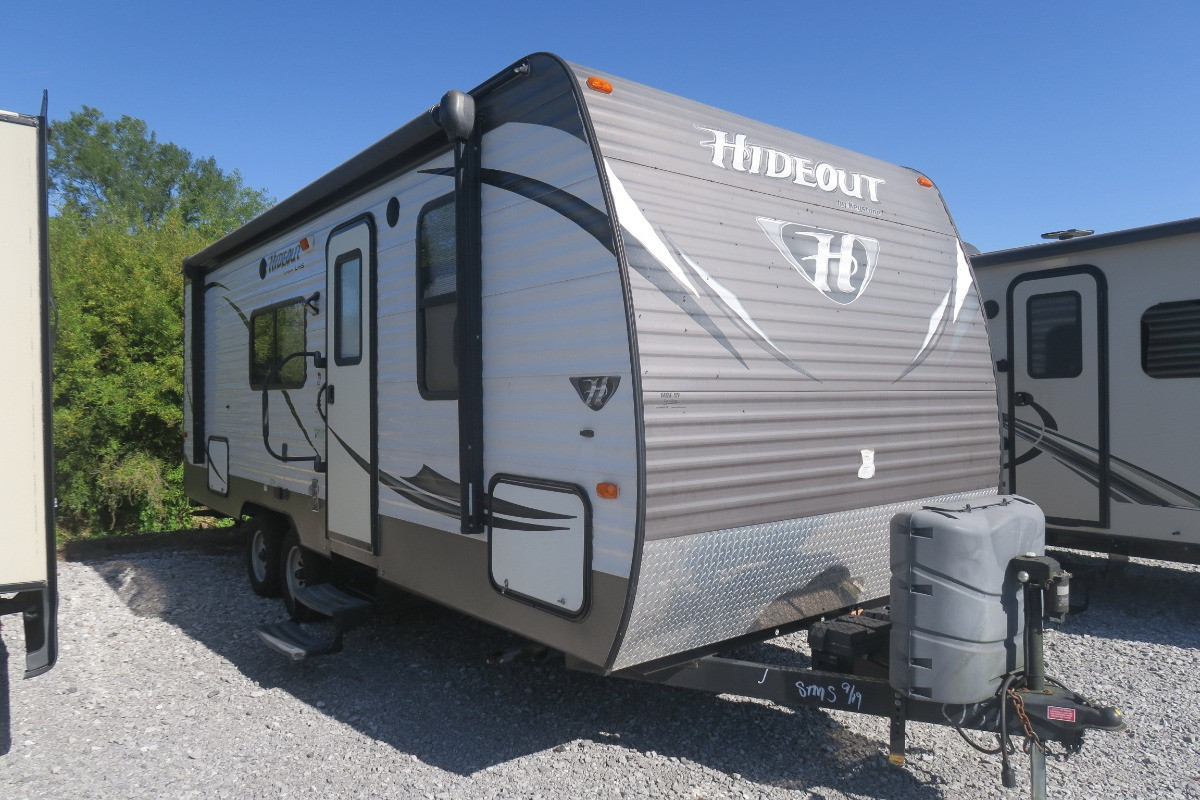 Keystone towable sitting in Berryland Camper\'s RV lot
